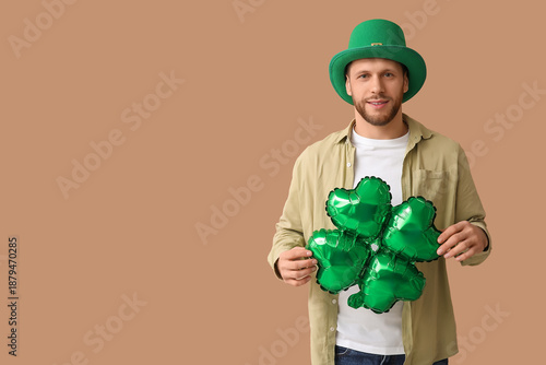 Young man in leprechaun hat...