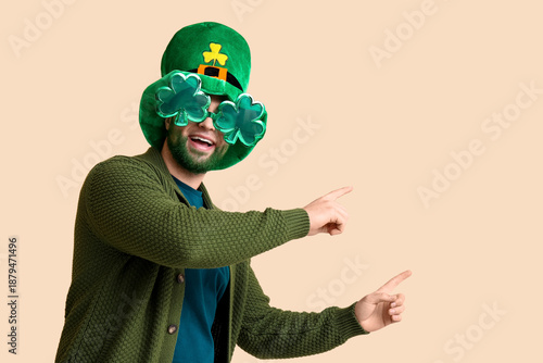 Young man in leprechaun hat...
