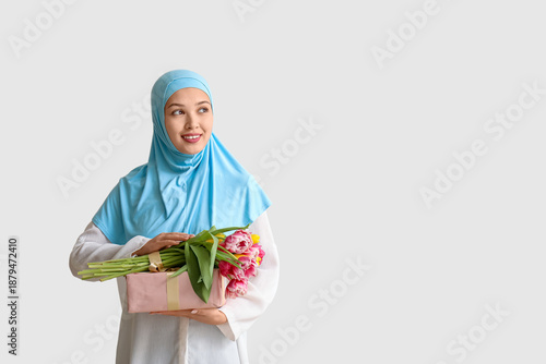 Young Asian Muslim woman wi...