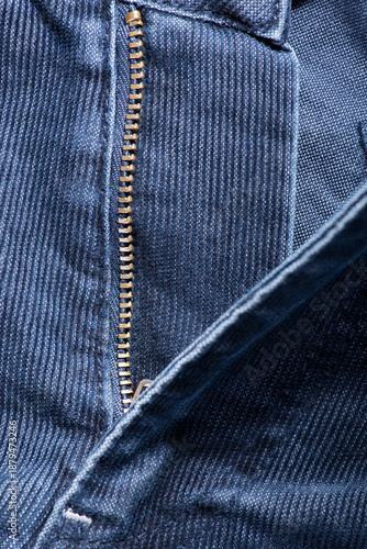 Obraz na plátně A fragment of denim corduroy trousers closeup