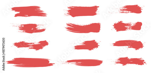 Set of Red Grunge Brush Strokes and Artistic Ink Splatter Elements for Creative Design