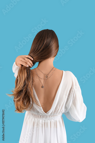 Beautiful young woman in wh...