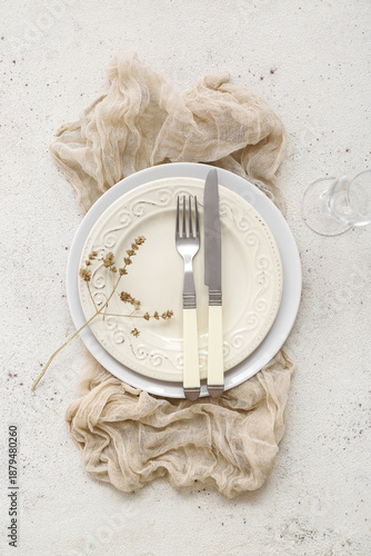 Stylish table setting on white background © Pixel-Shot