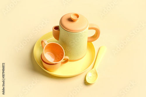 Plate with cups, teapot and...