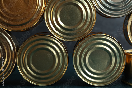 Assortment of tin cans with...