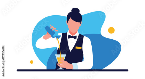 Professional female bartender in a uniform pouring a yellow cocktail from a shaker into a martini glass at a bar counter.
