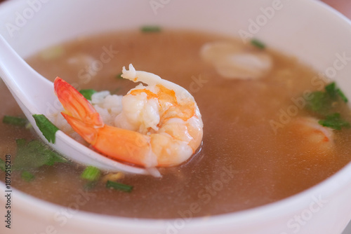 Shrimp soup in a white bowl,Thai style food.