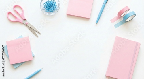 Pastel school supplies frame on white background. Pink and blue stationery flat lay with copy space.