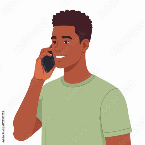 Young man happily talking on mobile phone with a friendly smile