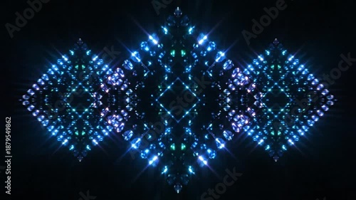 Abstract diamond shapes glittering with cool blue light shimmering symmetrically on a black background