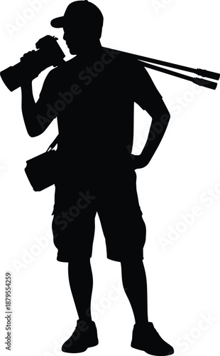 Silhouette of a cameraman with a camera and tripod, wearing a bag and a cap photographer videographer