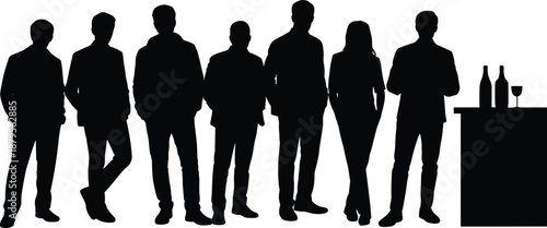 Seven people standing at a bar with bottles and a glass