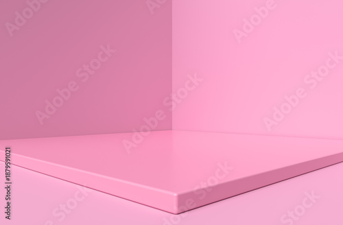 Pink platform creating an abstract corner in a studio setting