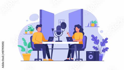 Two people in a studio recording a podcast with laptops and a microphone