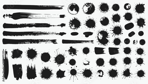 Black ink splashes, blots, brushes, and splatters on white background for design resources