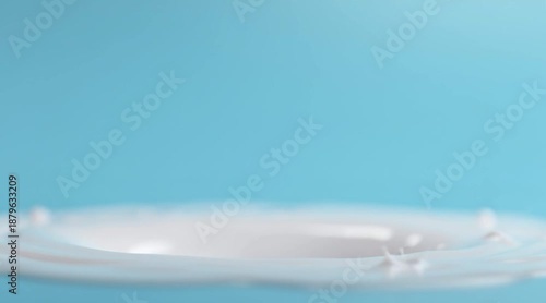 Splashing milk droplets create dynamic crown shape on liquid surface