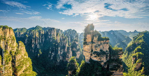 Photos Majestic sandstone pillars of Zhangjiajie National Forest Park in Hunan China under a bright blue sky with sunlight