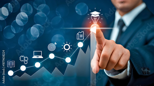 Business growth and success represented by a businessman's hand interacting with a glowing digital graph and icons