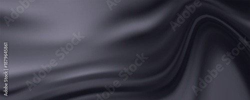 Abstract dark gray fabric with subtle light blue and green highlights, creating a smooth, flowing, and luxurious texture.