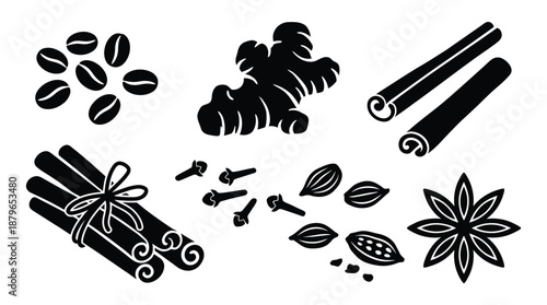 Assortment of whole coffee beans ginger root cinnamon sticks cardamom pods spices