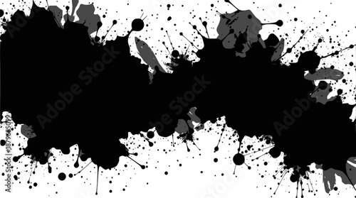 Abstract black ink splatters and paint splashes creating a grunge horizontal banner on a white background, suitable for graphic design elements.