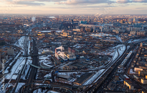 Bild auf Leinwand Aerial view of a Moscow city with buildings, roads, and some snow