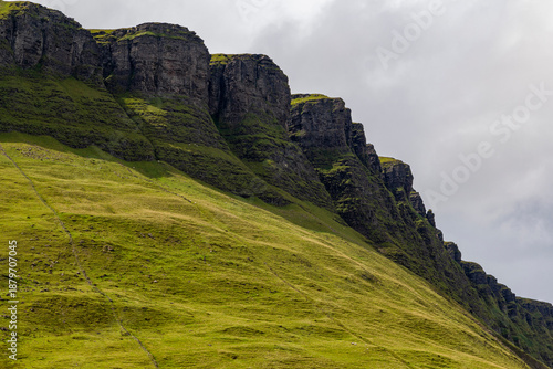 a view from the valley up to the peak of the famous ben bulben mountain in sligo at a cloudy summer day, ireland