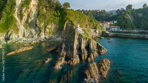 Lighthouse of Cudillero on Rocky Cliffs in Asturias