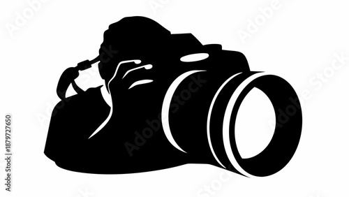 Photographer at work with camera equipment in hand