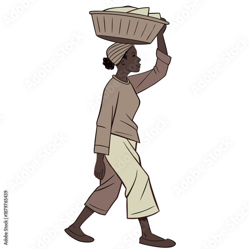 Woman carrying basket on her head walking dark skin