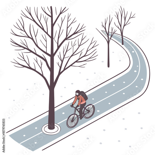 Cyclist riding on snow covered bike lane with bare trees