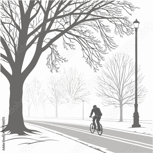Grayscale of cyclist riding bicycle on snowy road with bare trees and streetlamp