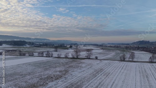 Switzerland countryside winter landscape with snow aerial footage