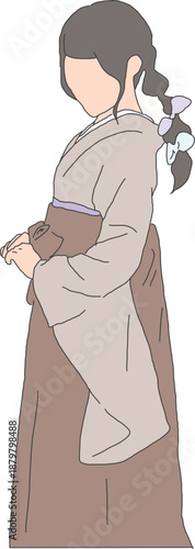 卒業式で袴を着た女性の横顔