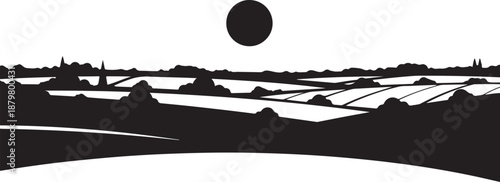 Black and white landscape with hills and sunset silhouette