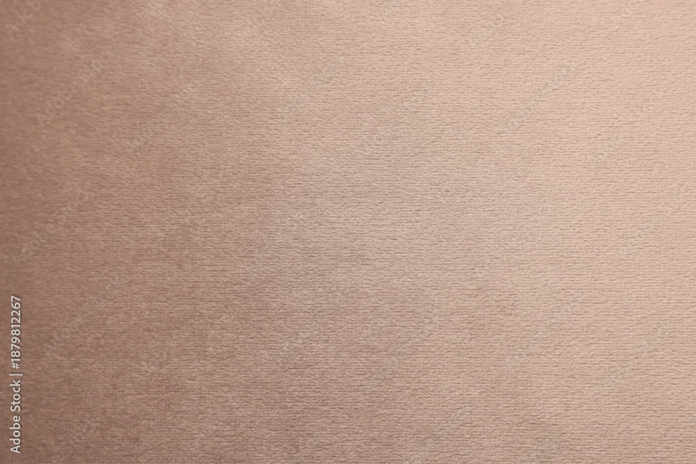 Fototapeta premium Texture of beige fabric as background, top view