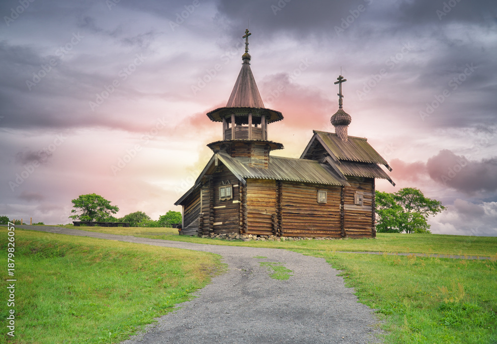 Fototapeta premium View on the old religion chapel of the famous Kizhi Pogost at summer cloudy day.