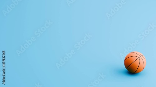 Basketball Ball Rolling Left to Right and Right to Left, on Blue Background with Copy Space, 3D Animation