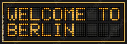 Orange color led banner in word welcome to berlin on black background