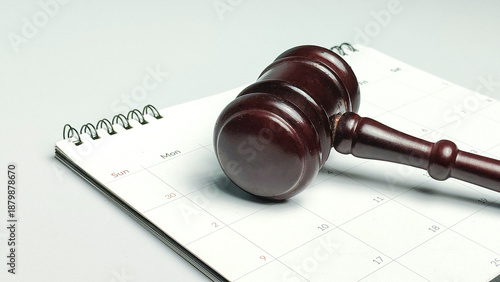 Bilde på lerret Court date and legal deadline concept featuring wooden judge gavel on calendar n