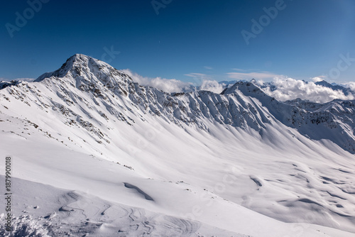 Ski slopes and beautiful winter landscape in Swiss Alps, Ski region Arosa-Lenzerheide