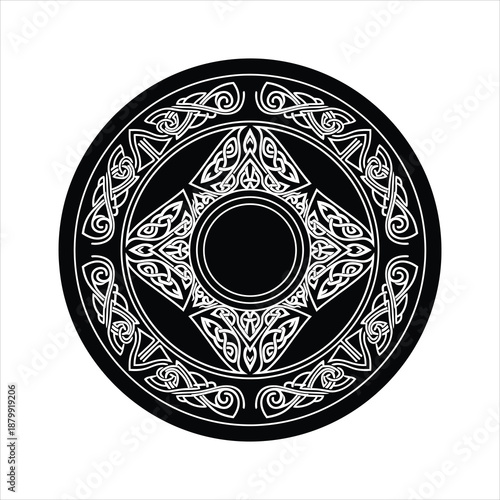 Intricate celtic knotwork design on circular black and white emblem