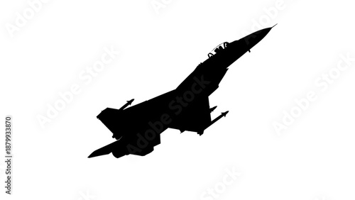 Silhouette of a fighter jet soaring through the sky