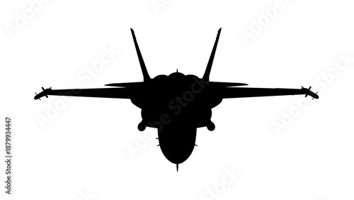 Silhouette of a fighter jet flying in the air