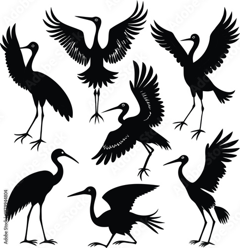 Black silhouettes of cranes in various poses, an elegant collection for design