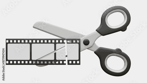 Scissors cutting film strip representing video editing process.