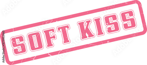 A charming pink distressed stamp design features the uplifting phrase Soft Kiss in a rectangular frame