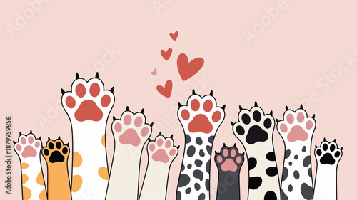 Many Cat Paws Raised Up Against Pink Background kitten