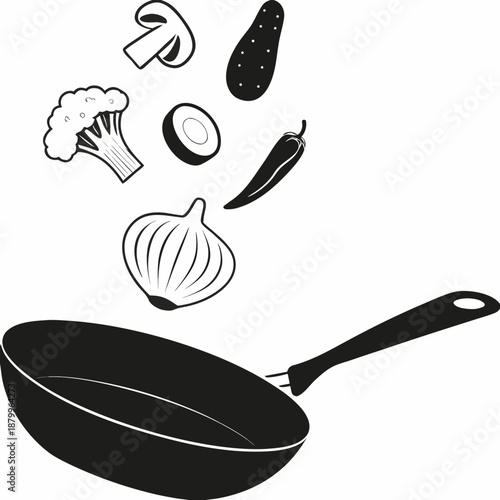 A black and white illustration of vegetables falling into a frying pan