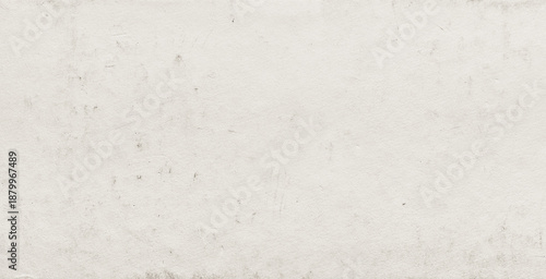 Grunge beige colored paper background with dirt scuffs and scratches